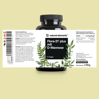 Eine schwarze Flasche mit der Aufschrift "Flora-21 plus mit D-Mannose" von natural elements steht auf einem cremefarbenen Hintergrund, mit grüner Blattgrafik und Produktinformationen in deutscher Sprache auf dem Etikett.